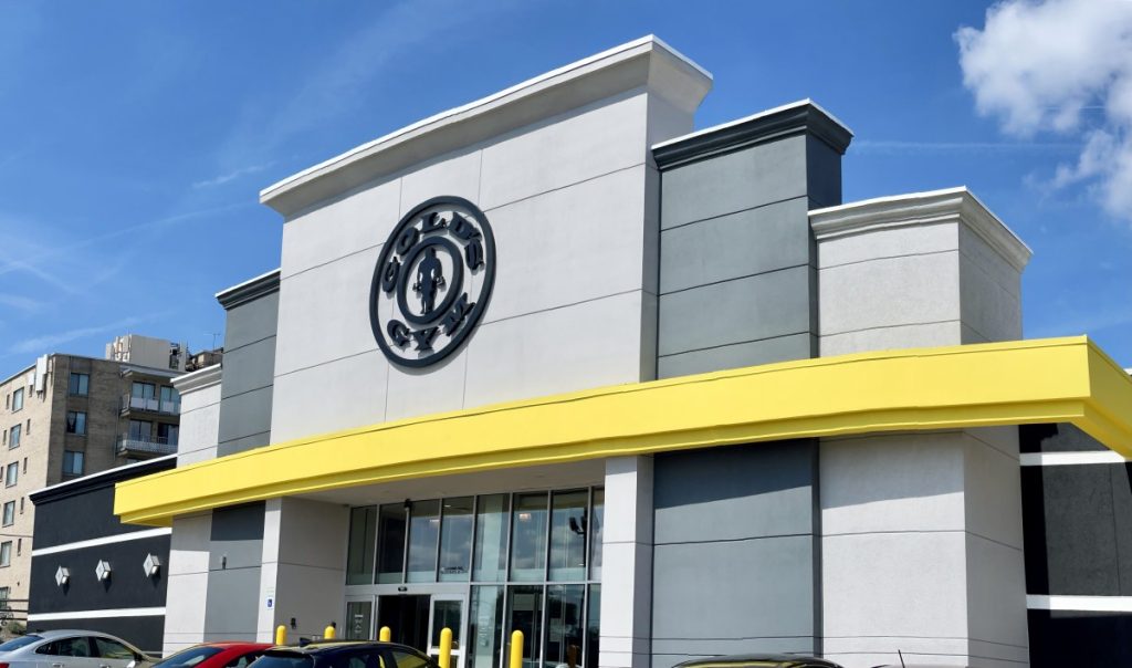 20210920 163713268 iOS We are a Gold’s Gym preferred supplier.  As a supplier we custom design and build commercial cabinetry including the reception desk, retail displays, lockers, fuel-up zones, cycling stages, kids clubs, smoothie bars, and wet/dry vanities.  In addition to the interior buildout needs, we also build and install fitness center interior and exterior signage.
