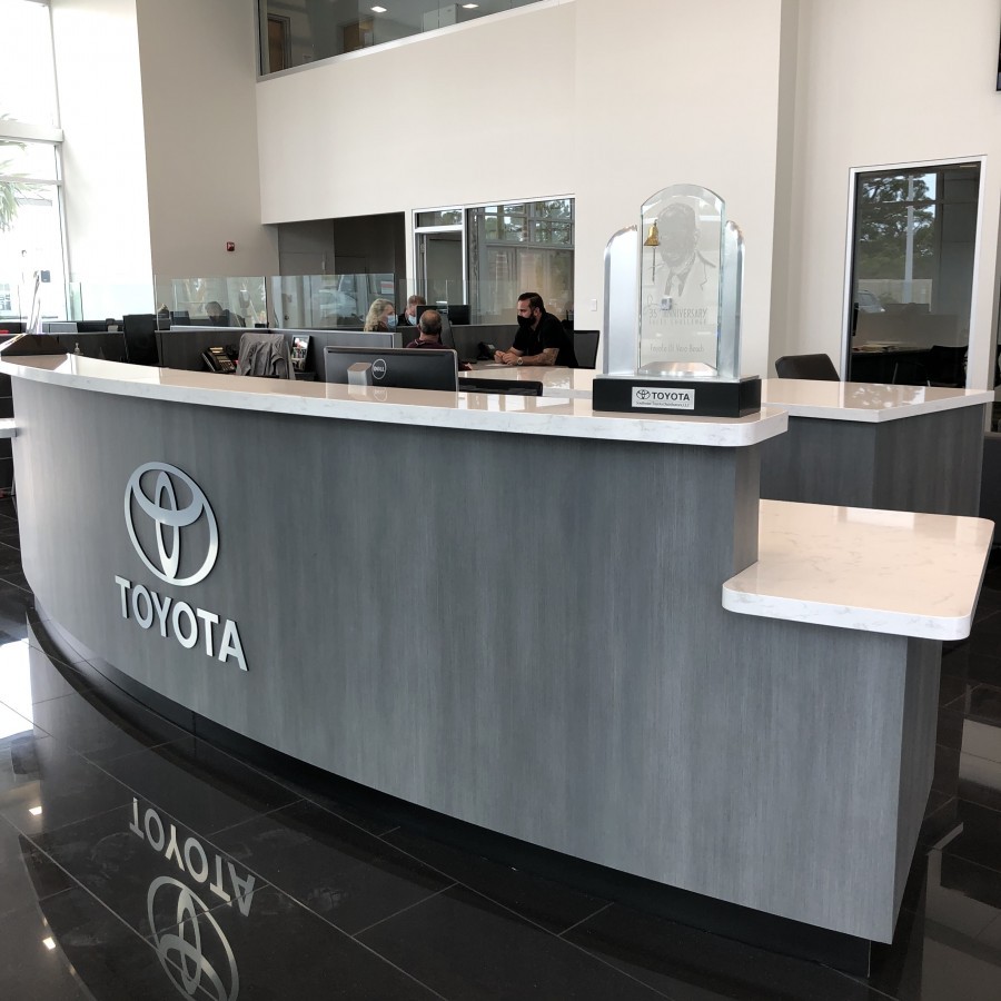IMG 9364 Summer 2020 took our install team to Florida to install auto dealer cabinetry we designed and built for Toyota Vero Beach.  This project was completed in partnership with Global Commercial Furnishings, Inc.