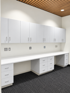 Dental office cabinets at Modern Dental: Formica Brite White upper cabinets and drawers under a Corian Glacier White top